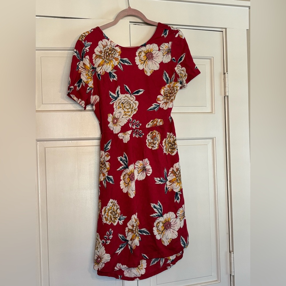 Roxy red floral summer dress with open back. 19” from waist down. Never worn